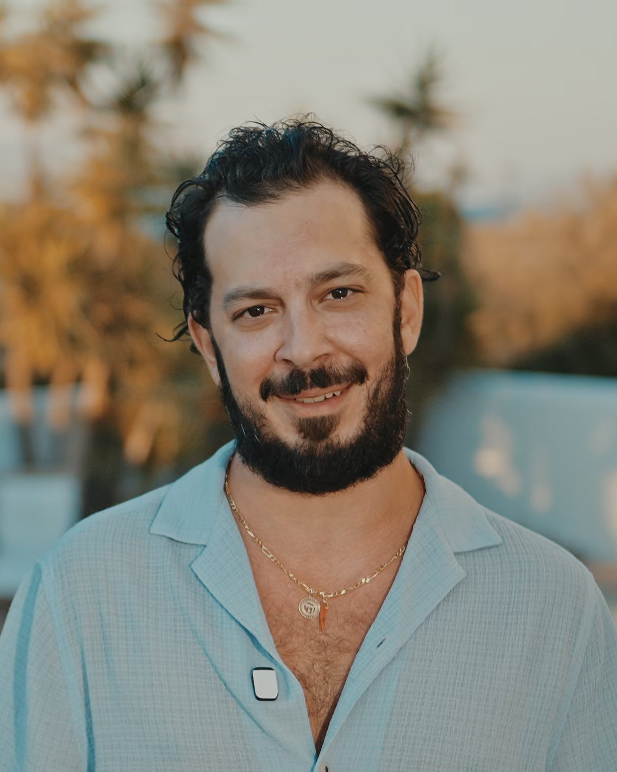 Ilann, French chef and host of Villa Kyma, by the pool of the villa in Aegina